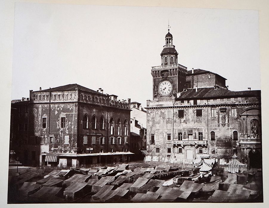Market tents on plazza, Italy