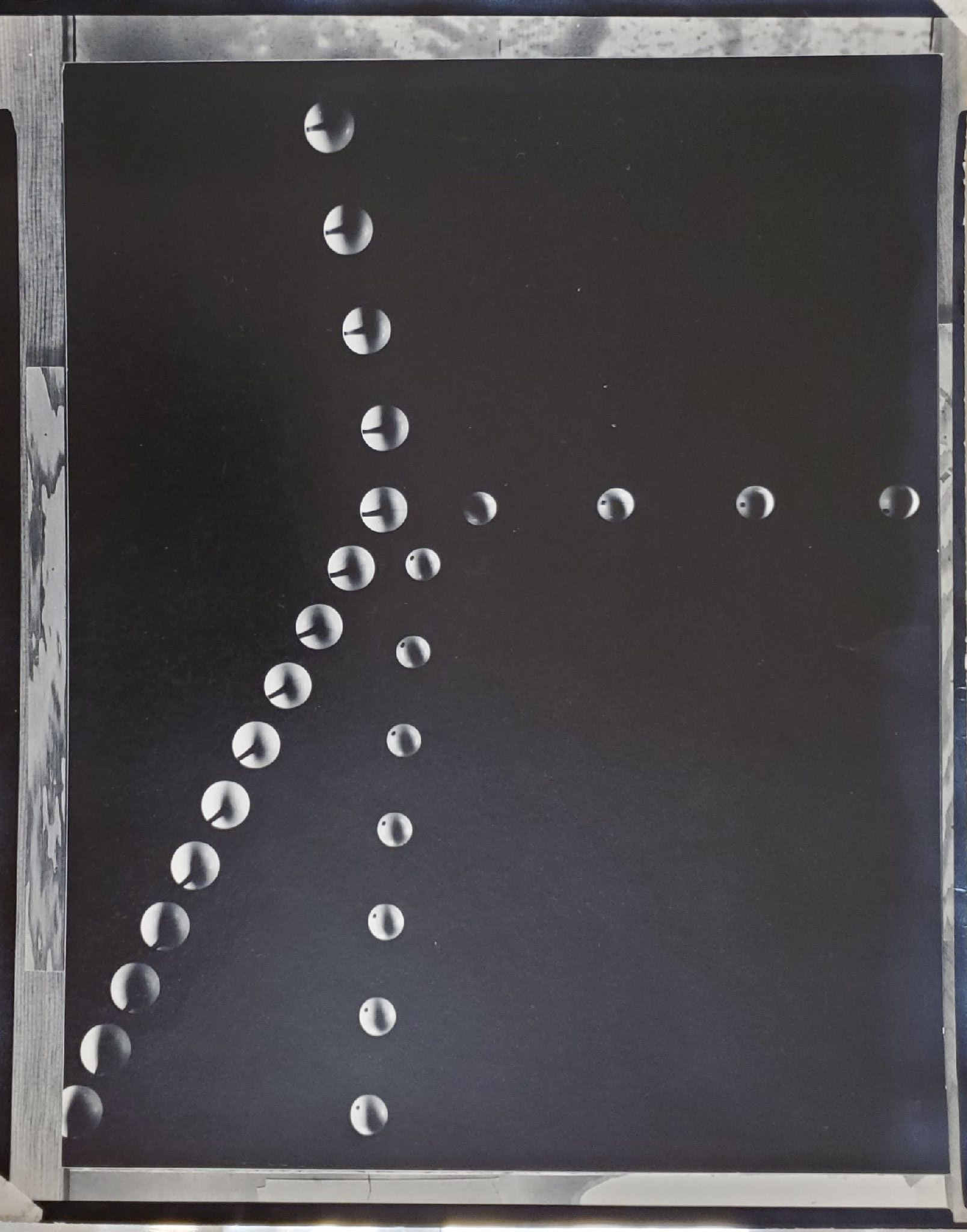 Collision of a Moving Sphere and a Stationary Sphere